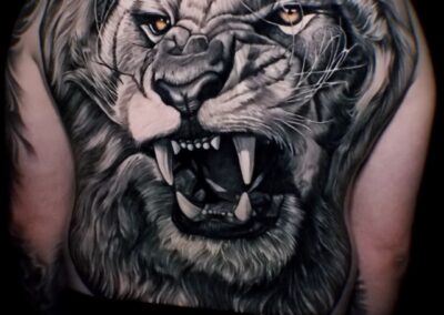 Raphael Barros lion tattoo